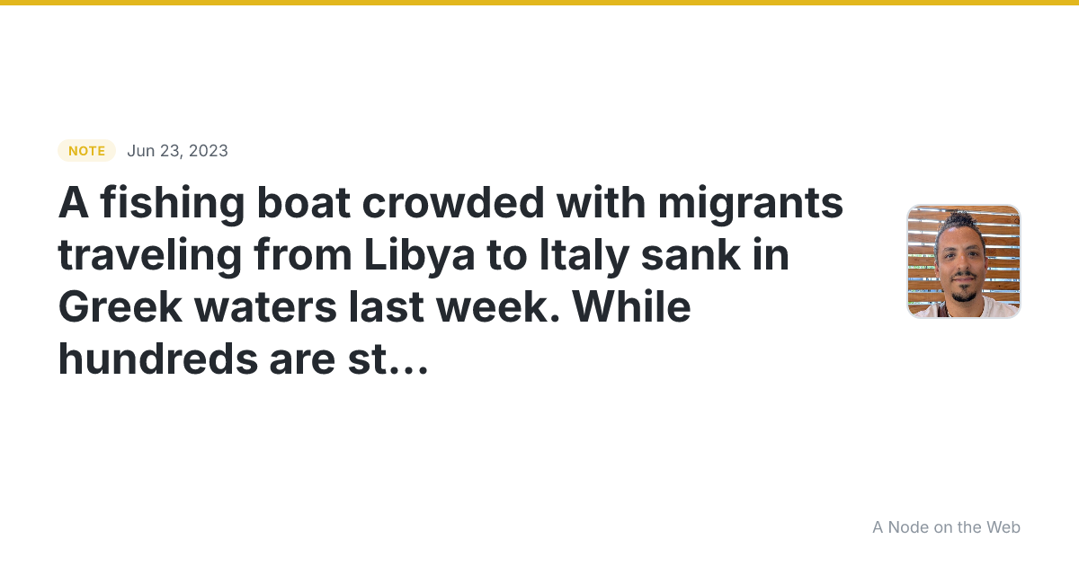 A fishing boat crowded with migrants traveling from Libya to...